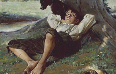 Boy, dog, lounging under a tree